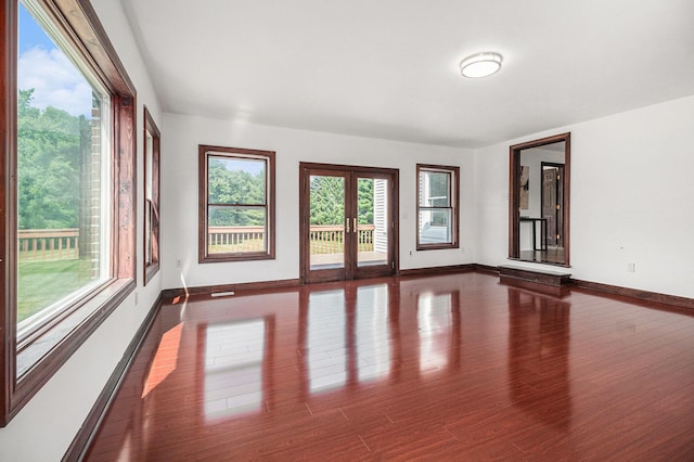 8411 Reese Ln, Ann Arbor, MI 48103 - unfurnished room with french doors and wood finished floors