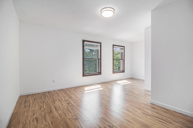 8411 Reese Ln, Ann Arbor, MI 48103 - unfurnished room featuring light wood-type flooring and baseboards