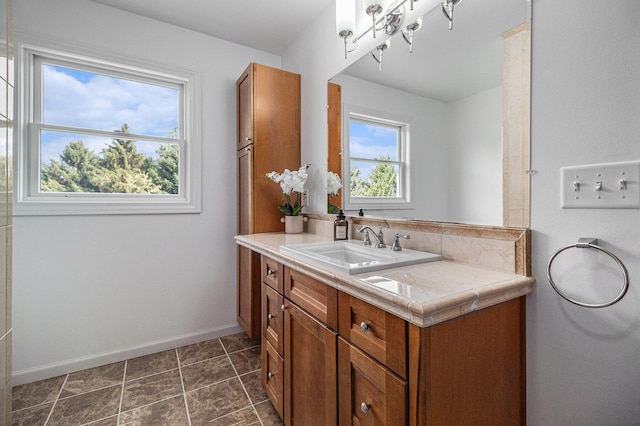 8411 Reese Ln, Ann Arbor, MI 48103 - bathroom with vanity and baseboards