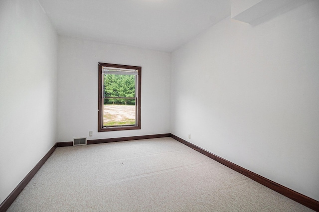 8411 Reese Ln, Ann Arbor, MI 48103 - unfurnished room featuring light carpet and baseboards