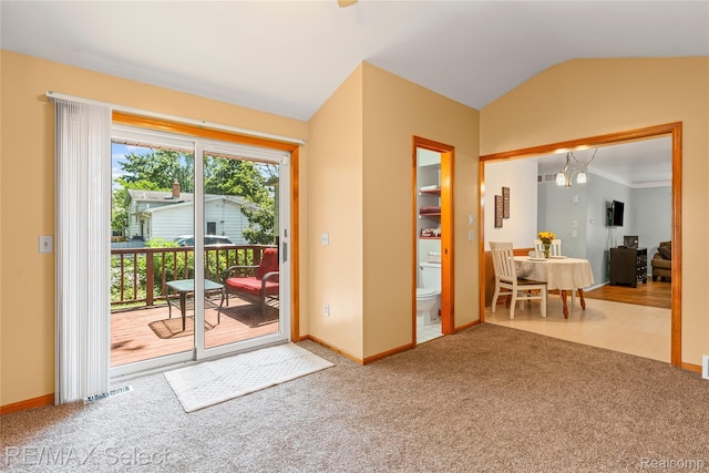 4391 Ashlawn Dr, Flint, MI 48507 - entryway featuring carpet, lofted ceiling, and a chandelier