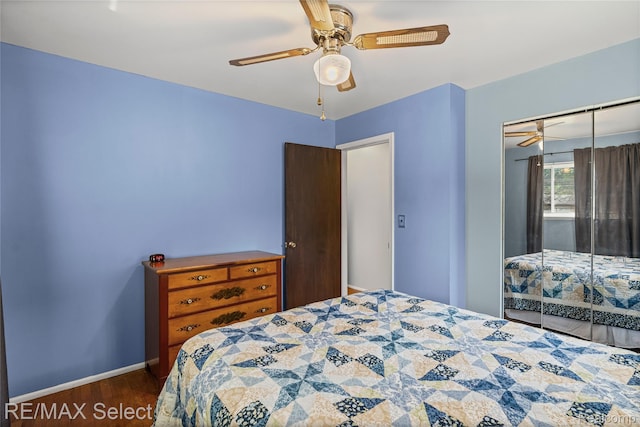 4391 Ashlawn Dr, Flint, MI 48507 - bedroom featuring dark wood finished floors, a closet, and ceiling fan