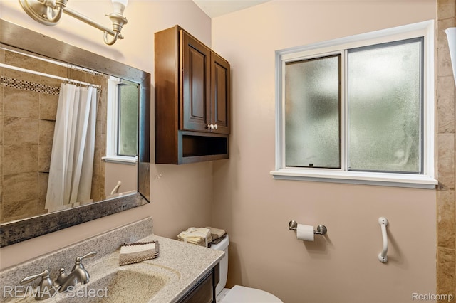 4391 Ashlawn Dr, Flint, MI 48507 - full bathroom featuring vanity and a tile shower