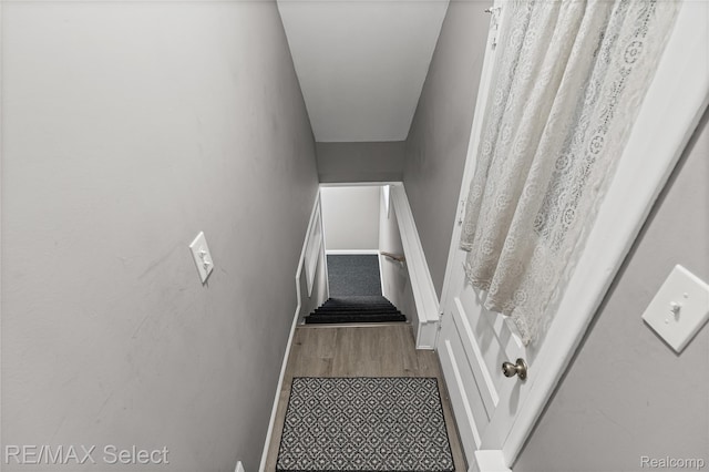 4391 Ashlawn Dr, Flint, MI 48507 - stairs featuring wood finished floors