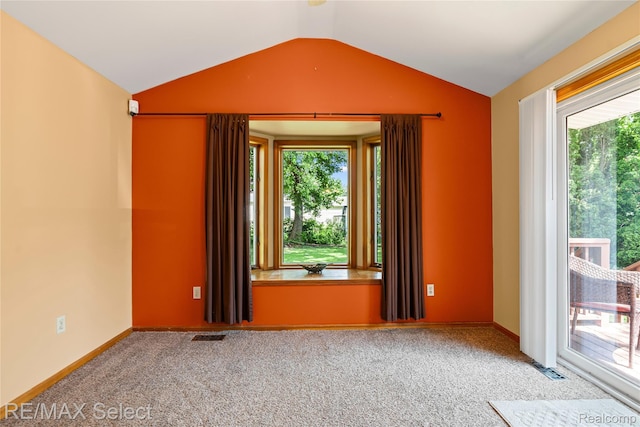 4391 Ashlawn Dr, Flint, MI 48507 - carpeted spare room featuring plenty of natural light and vaulted ceiling