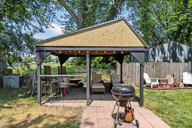 210 S Forbes St, Jackson, MI 49203 - view of patio / terrace with a gazebo, area for grilling, and a fire pit