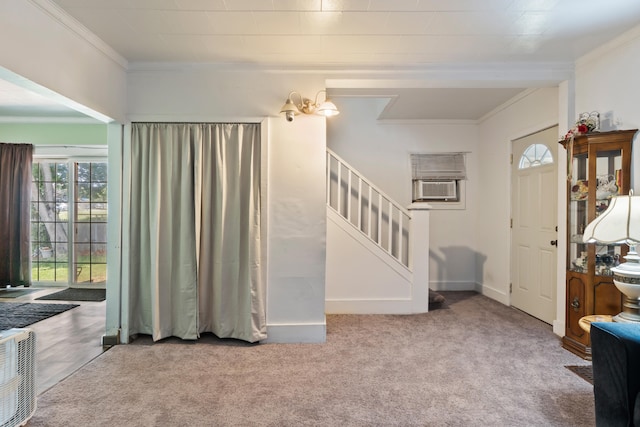 210 S Forbes St, Jackson, MI 49203 - carpeted entrance foyer featuring plenty of natural light, crown molding, stairs, and cooling unit