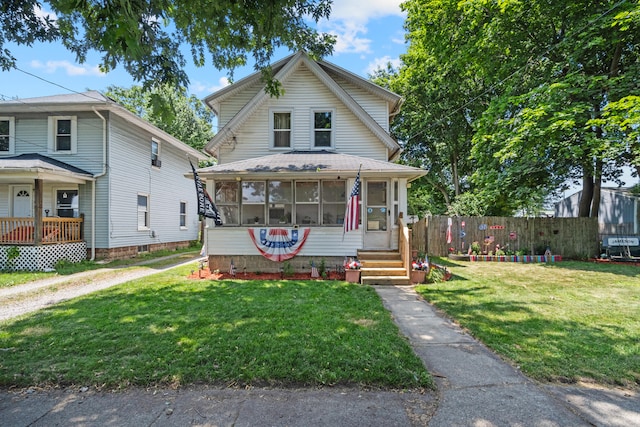 210 S Forbes St, Jackson, MI 49203 - view of front of home featuring a sunroom