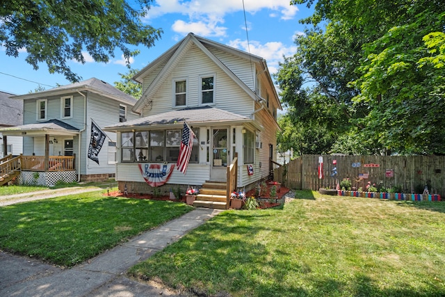 210 S Forbes St, Jackson, MI 49203 - view of front of house with a sunroom