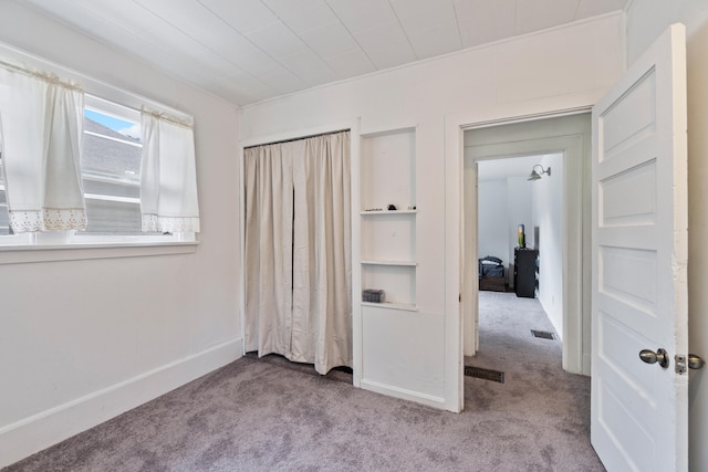 210 S Forbes St, Jackson, MI 49203 - unfurnished bedroom featuring carpet