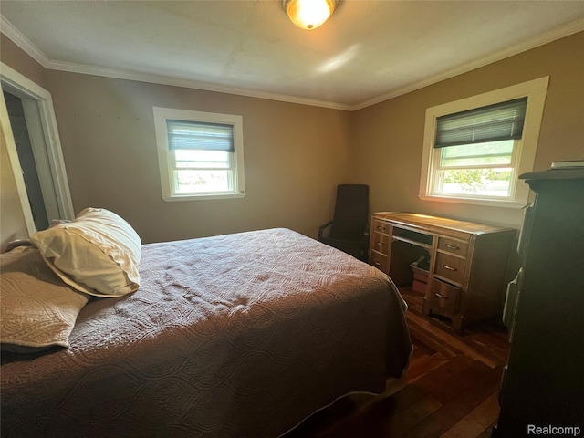 6860 Sheridan Rd, Saginaw, MI 48601 - bedroom with multiple windows, crown molding, and dark wood-type flooring