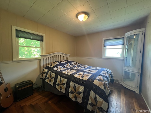6860 Sheridan Rd, Saginaw, MI 48601 - bedroom with dark wood-style flooring