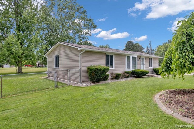 6516 Weyer Rd, Imlay City, MI 48444 - view of front facade with a gate