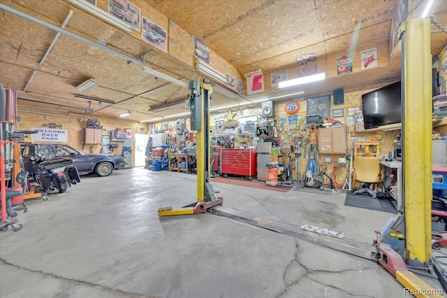 6516 Weyer Rd, Imlay City, MI 48444 - garage featuring a workshop area
