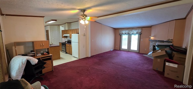 19270 W Brant Rd, Brant, MI 48614 - unfurnished living room with a ceiling fan, french doors, an office area, light carpet, and a textured ceiling