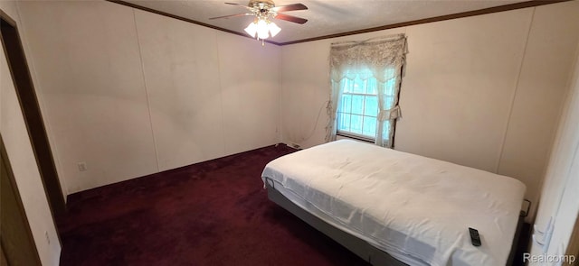 19270 W Brant Rd, Brant, MI 48614 - bedroom with dark carpet, ornamental molding, ceiling fan, a decorative wall, and a textured ceiling