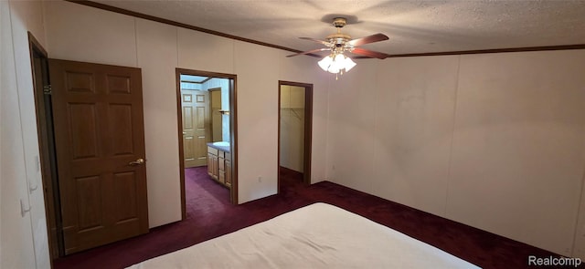 19270 W Brant Rd, Brant, MI 48614 - unfurnished bedroom with ornamental molding, a textured ceiling, dark colored carpet, and ceiling fan