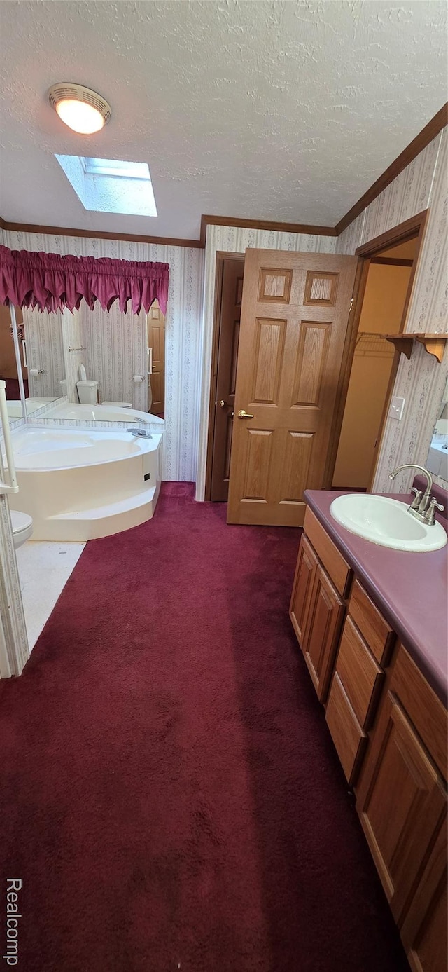 19270 W Brant Rd, Brant, MI 48614 - bathroom with a skylight, wallpapered walls, ornamental molding, a textured ceiling, and a bath