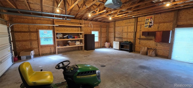 19270 W Brant Rd, Brant, MI 48614 - garage featuring a garage door opener