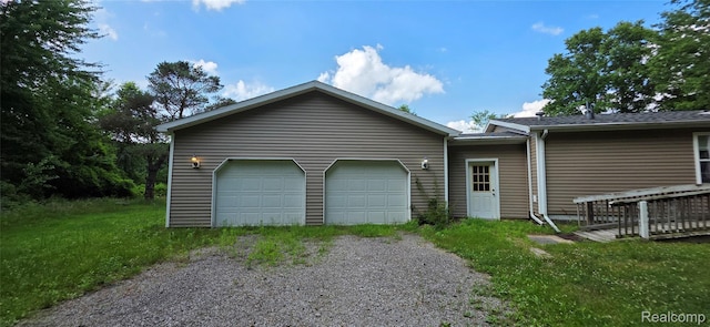 19270 W Brant Rd, Brant, MI 48614 - view of side of property with an attached garage and driveway