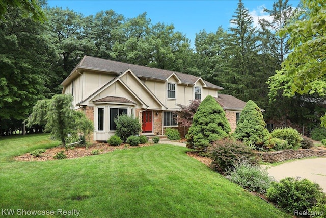 5152 Shenandoah Ct, West Bloomfield, MI 48323 - view of front of home with a front yard and stucco siding