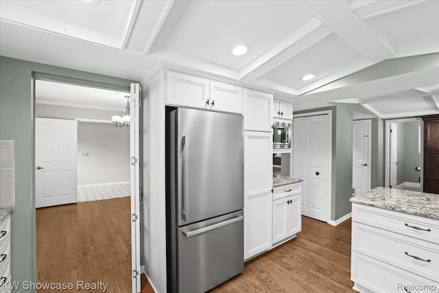 5152 Shenandoah Ct, West Bloomfield, MI 48323 - kitchen with stainless steel appliances, wood finished floors, white cabinets, recessed lighting, and a chandelier