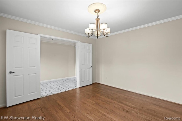 5152 Shenandoah Ct, West Bloomfield, MI 48323 - spare room with a chandelier, wood finished floors, and crown molding