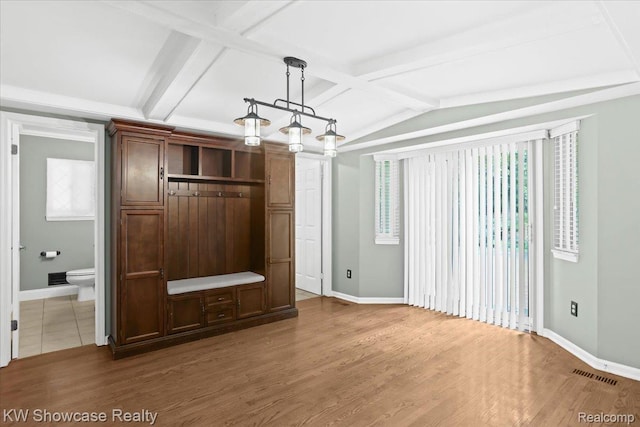 5152 Shenandoah Ct, West Bloomfield, MI 48323 - unfurnished living room featuring baseboards and wood finished floors