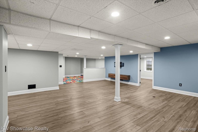 5152 Shenandoah Ct, West Bloomfield, MI 48323 - finished basement with wood finished floors, a paneled ceiling, and recessed lighting