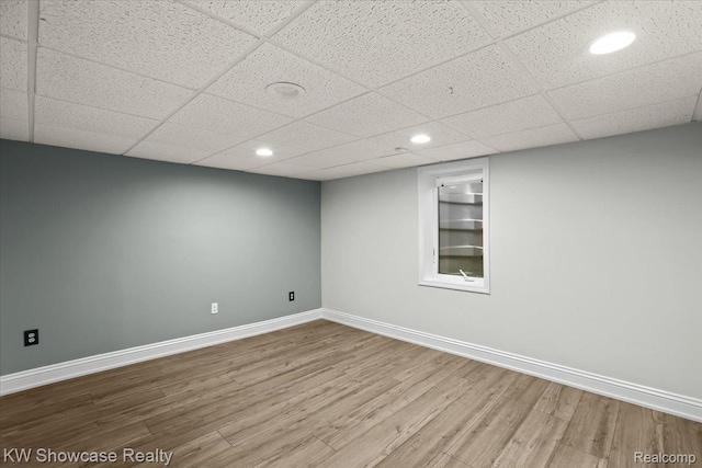 5152 Shenandoah Ct, West Bloomfield, MI 48323 - empty room with wood finished floors, a drop ceiling, and recessed lighting