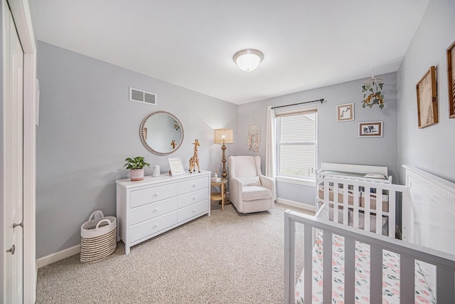 3544 Lexington Cir, Dexter, MI 48130 - carpeted bedroom featuring a crib and baseboards