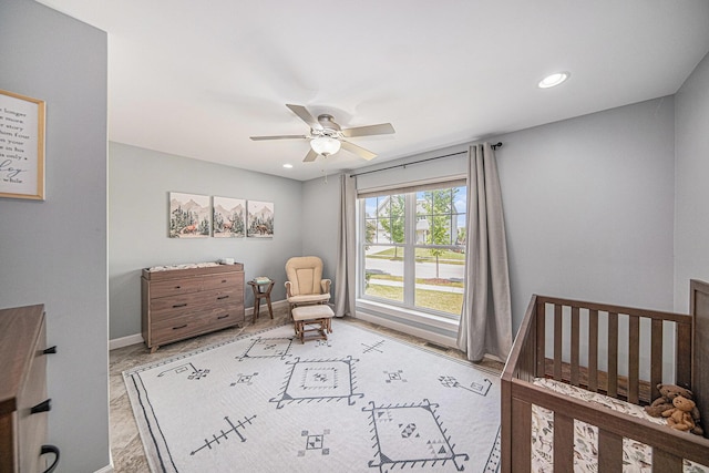 3544 Lexington Cir, Dexter, MI 48130 - bedroom featuring recessed lighting, ceiling fan, and a nursery area