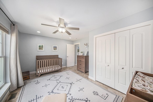 3544 Lexington Cir, Dexter, MI 48130 - bedroom with a closet and a ceiling fan