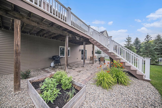 3544 Lexington Cir, Dexter, MI 48130 - view of patio featuring stairway, a vegetable garden, area for grilling, and a wooden deck
