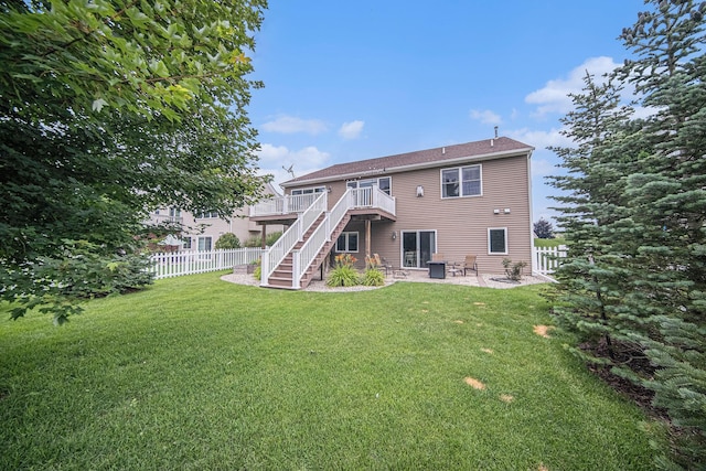 3544 Lexington Cir, Dexter, MI 48130 - rear view of property with a patio, stairs, and a wooden deck