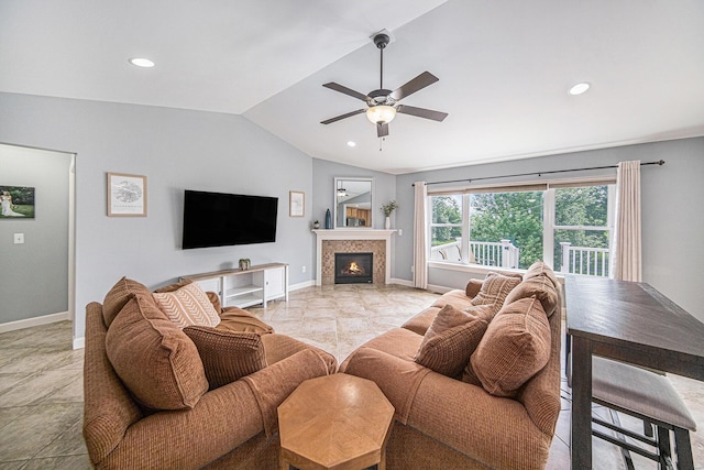3544 Lexington Cir, Dexter, MI 48130 - living room with lofted ceiling, a ceiling fan, a fireplace, and recessed lighting