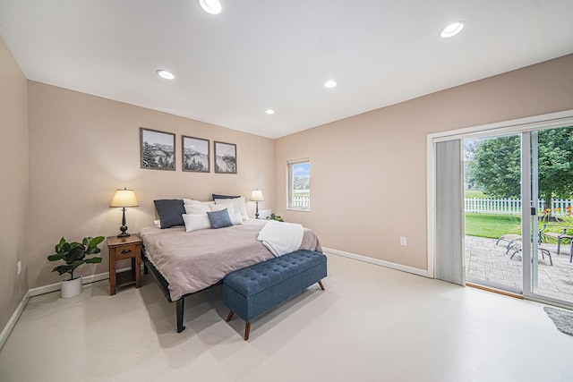 3544 Lexington Cir, Dexter, MI 48130 - bedroom featuring access to exterior, multiple windows, and recessed lighting
