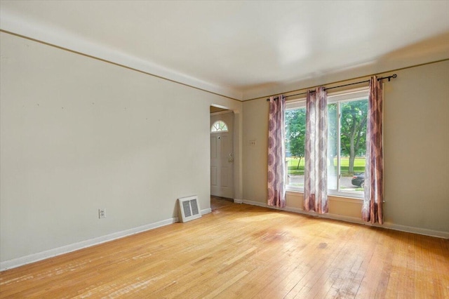 2251 Gardner Ave, Berkley, MI 48072 - empty room with light wood-style flooring and baseboards
