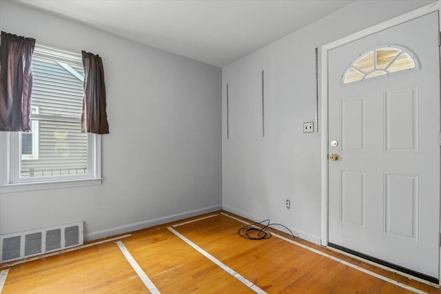 2251 Gardner Ave, Berkley, MI 48072 - foyer with wood finished floors and healthy amount of natural light
