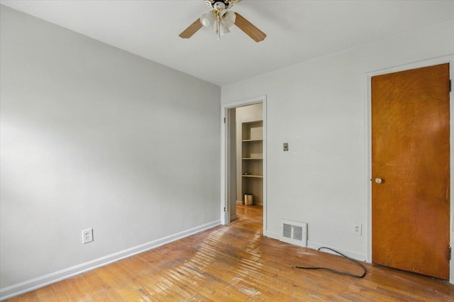 2251 Gardner Ave, Berkley, MI 48072 - unfurnished bedroom featuring wood finished floors and ceiling fan