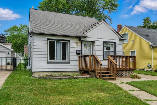 2251 Gardner Ave, Berkley, MI 48072 - bungalow-style home with board and batten siding, a deck, and roof with shingles