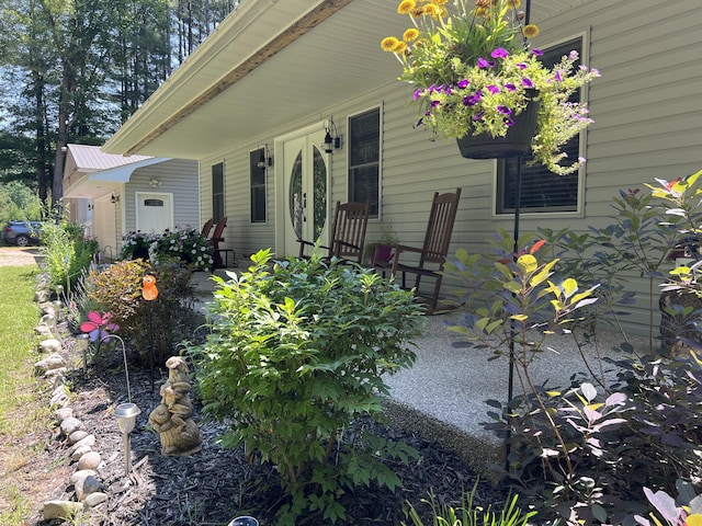 2564 Bialik Rd, Manistee, MI 49660 - view of front of house featuring french doors