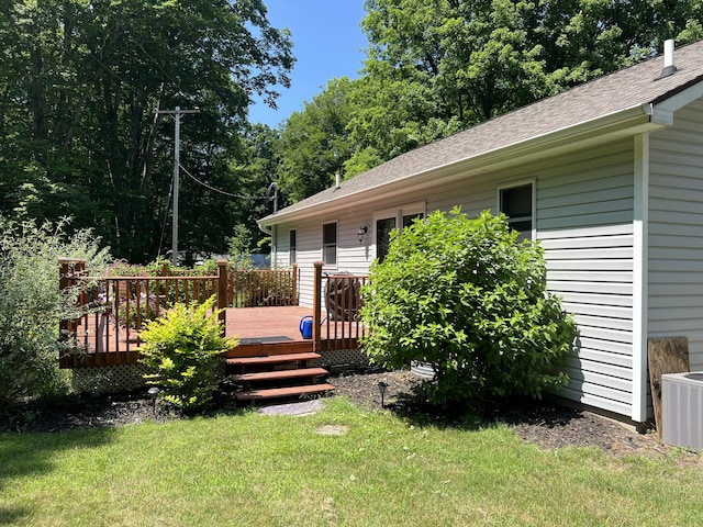 2564 Bialik Rd, Manistee, MI 49660 - view of grassy yard with a deck