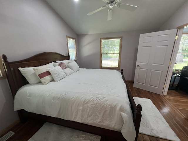 2564 Bialik Rd, Manistee, MI 49660 - bedroom with lofted ceiling, wood finished floors, and ceiling fan