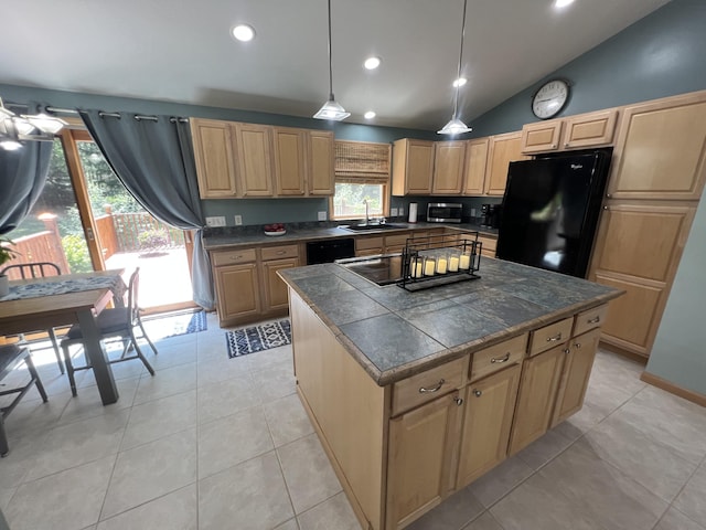 2564 Bialik Rd, Manistee, MI 49660 - kitchen with black appliances, vaulted ceiling, light brown cabinetry, a kitchen island, and light tile patterned flooring