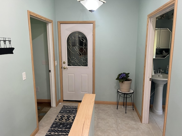 2564 Bialik Rd, Manistee, MI 49660 - entrance foyer with light tile patterned flooring
