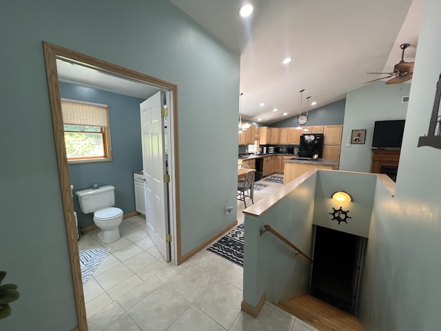 2564 Bialik Rd, Manistee, MI 49660 - hall with vaulted ceiling, an upstairs landing, recessed lighting, and light tile patterned flooring
