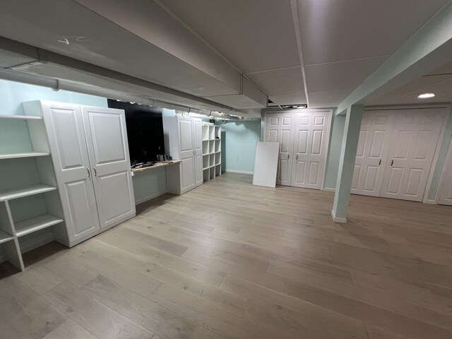 2564 Bialik Rd, Manistee, MI 49660 - finished basement featuring light wood-style floors
