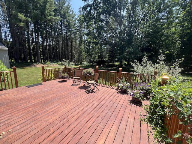 2564 Bialik Rd, Manistee, MI 49660 - wooden deck with a lawn