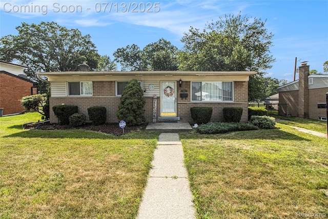 123 N Hawthorne St, Westland, MI 48185 - view of front of house with brick siding and a front lawn